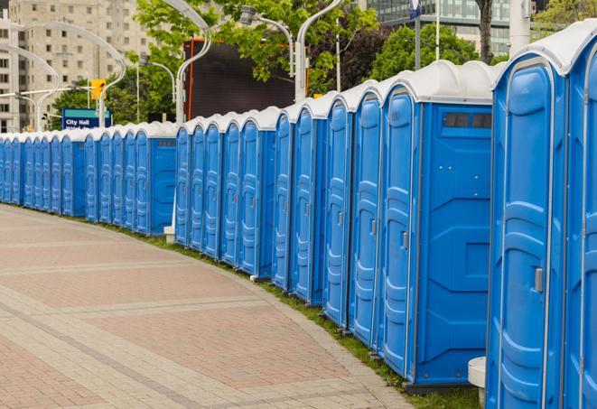 a row of portable restrooms at a trade show, catering to visitors with a professional and comfortable experience in Akron, NY